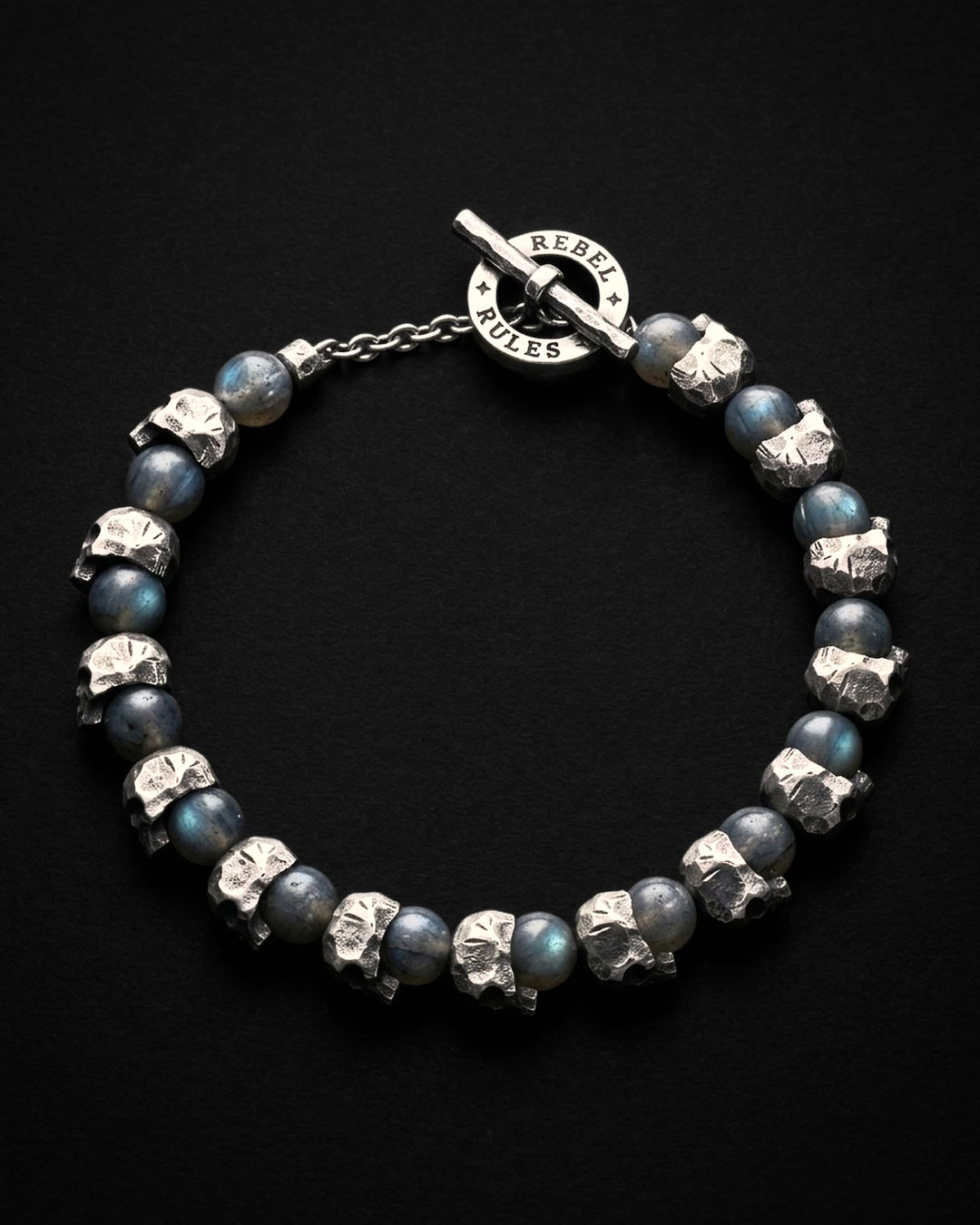 Raw I Bracelet in Labradorite Matte from above, the skull and labradorite beads in a circle with the toggle clasp