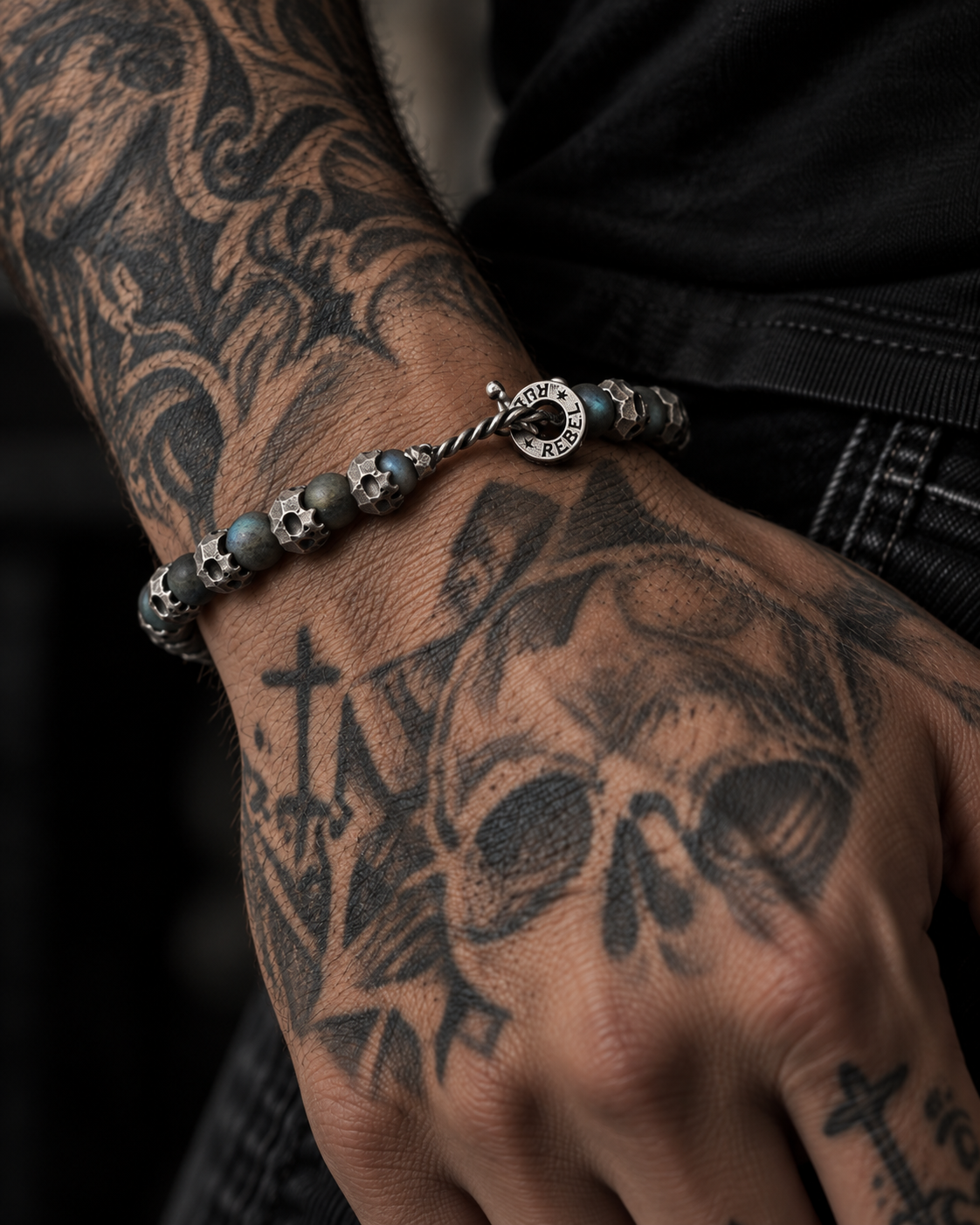 Raw I Bracelet in Labradorite Matte, on a hand tattooed with a skull