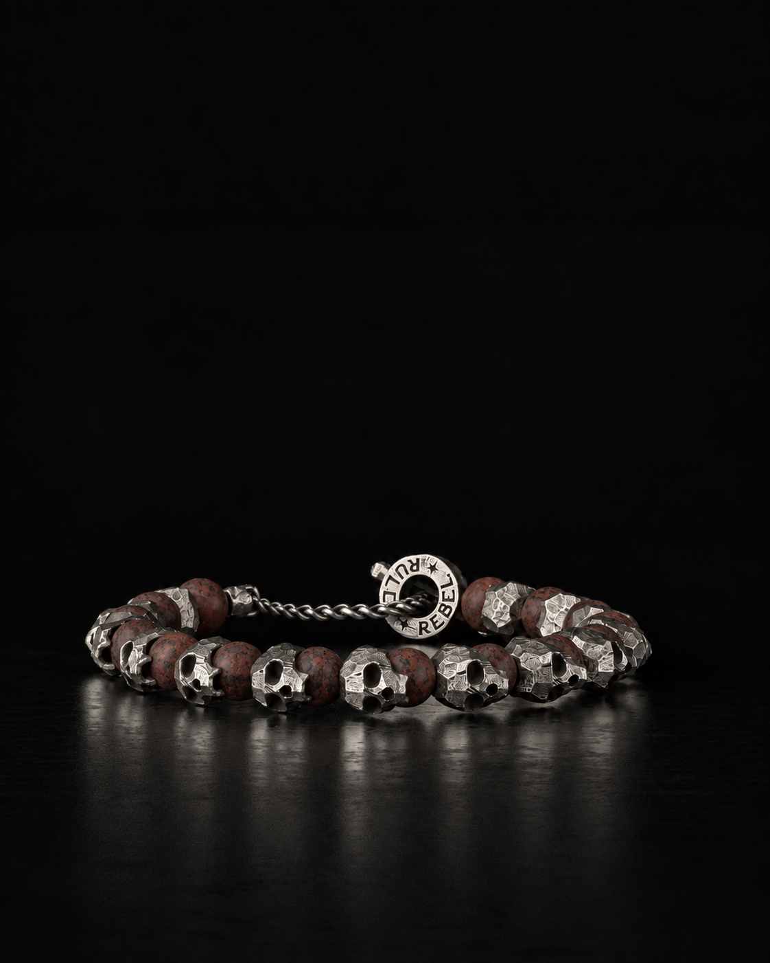 Raw I Bracelet, Red Brecciated Matte beads between cast silver skulls, on black