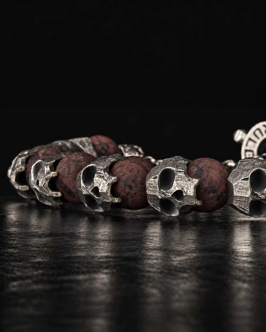 Raw I Bracelet close up, Red Brecciated Matte beads and pitted silver skulls