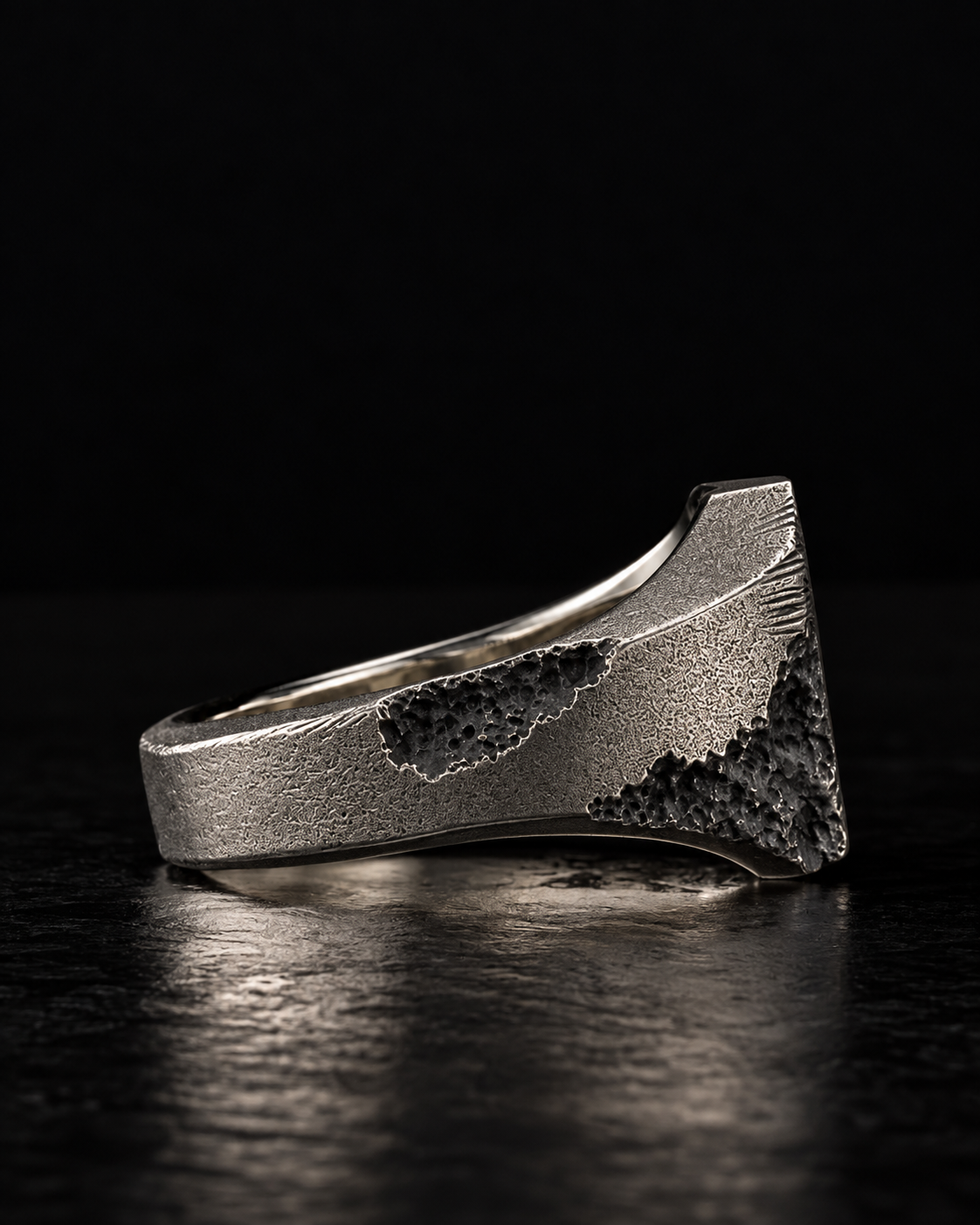 Raw II Ring in side profile, wedge-shaped shank rising to the signet plate