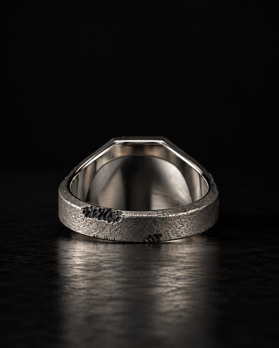 Raw II Ring from behind, polished inner band showing inside the rough outer shank