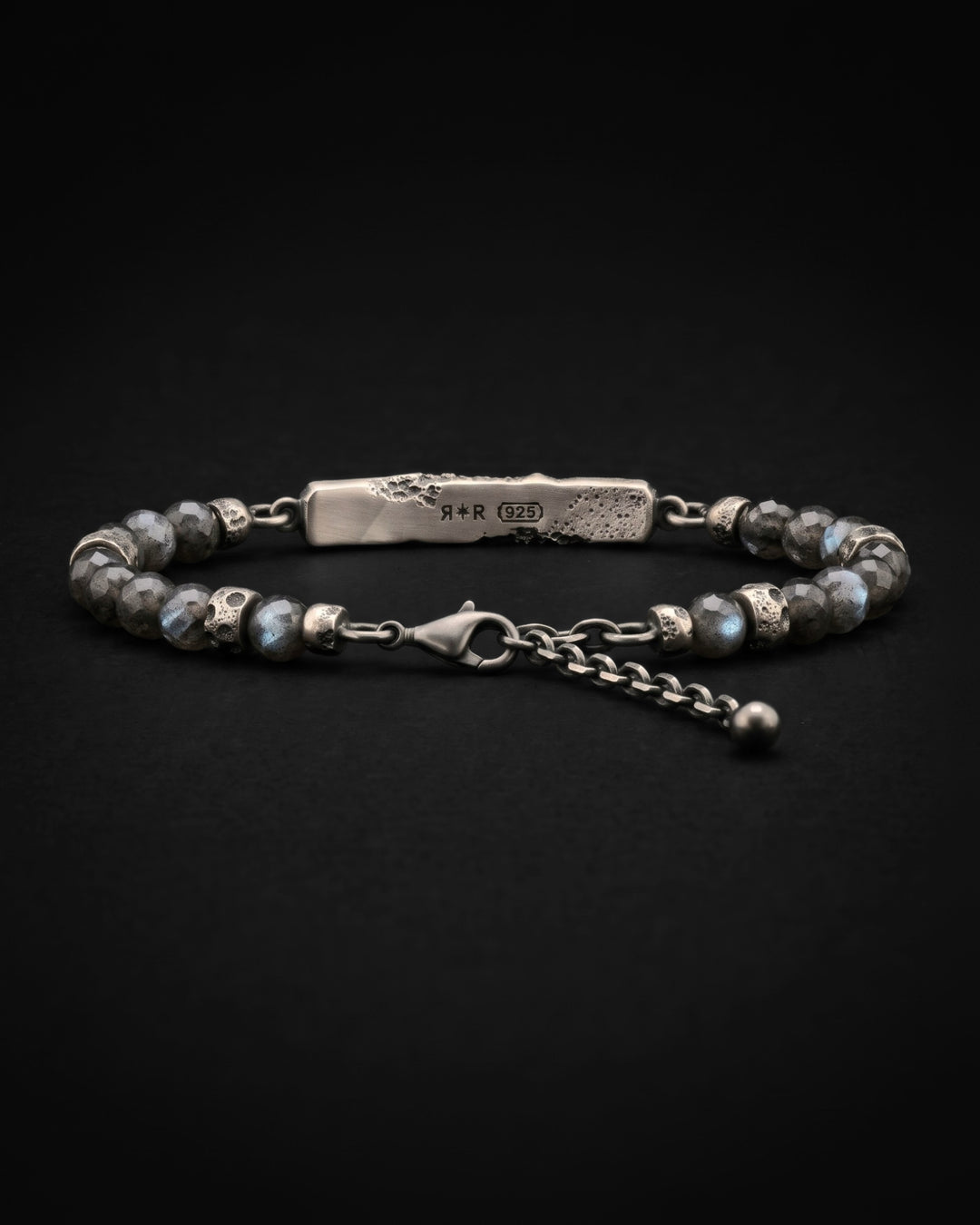 Raw V Bracelet from behind with labradorite beads, the RR star and 925 hallmarks on the inner face of the bar