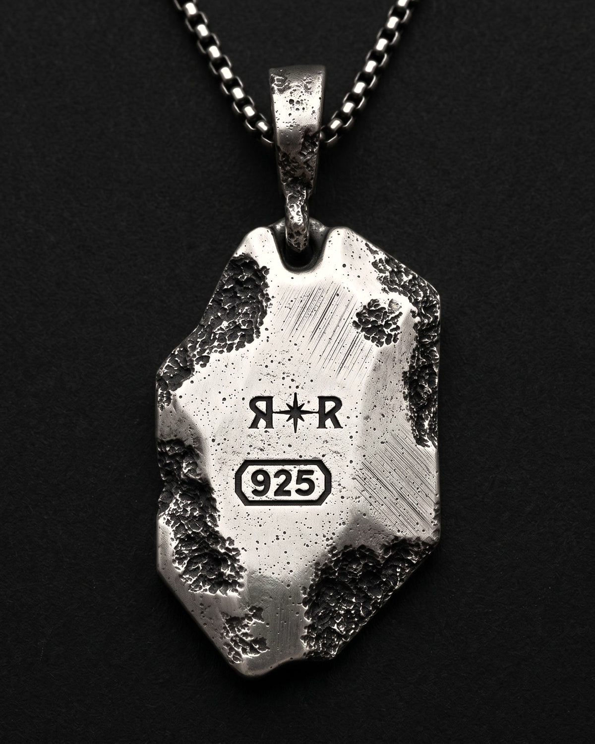 Raw VI Pendant from behind, the RR star hallmark and 925 laser engraved on the faceted back