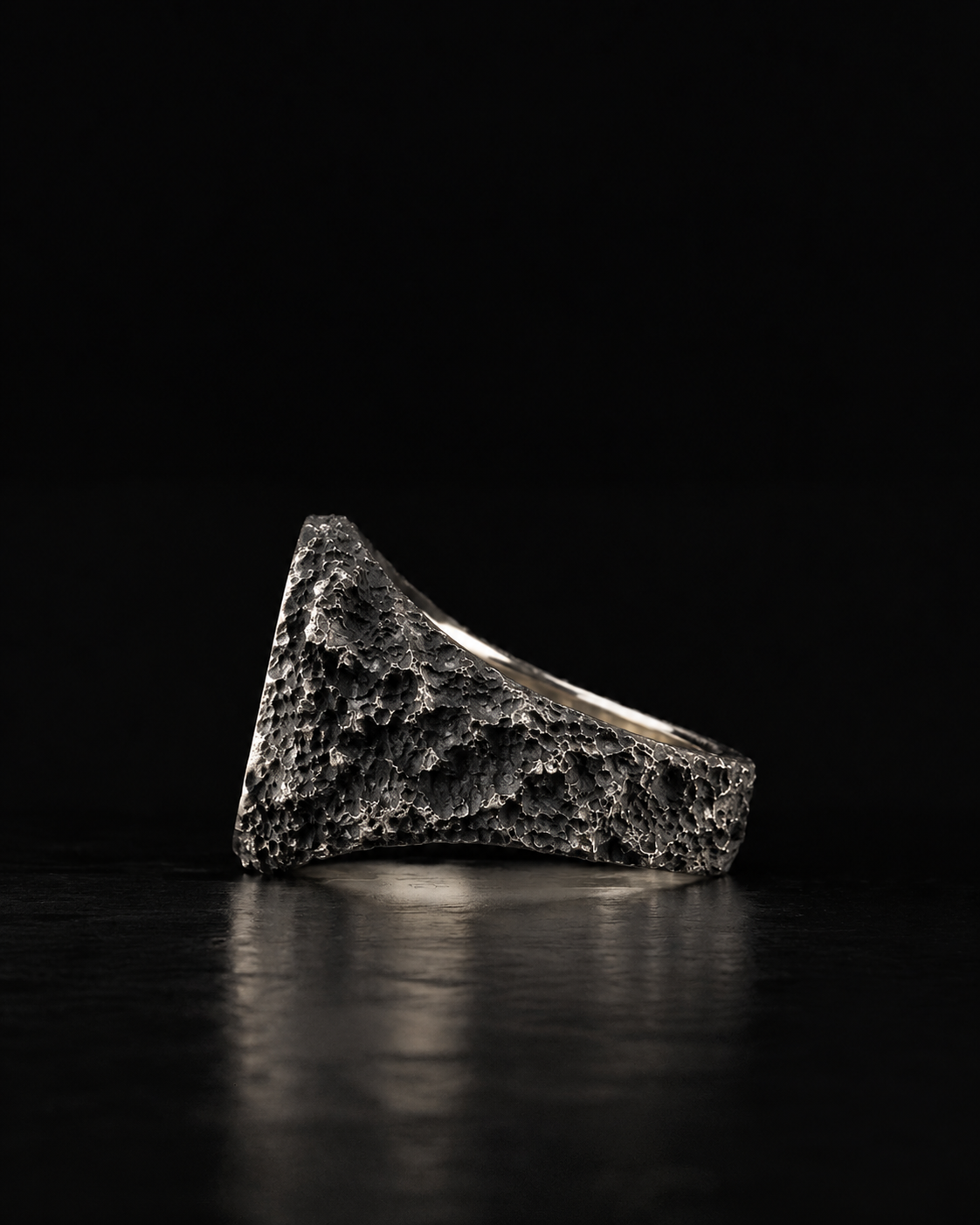 Raw VII Ring in side profile, crusted texture across the whole outer shank