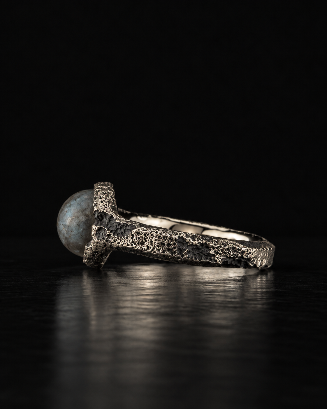 Raw VIII Ring side view, labradorite on the left and the full length of the pitted band