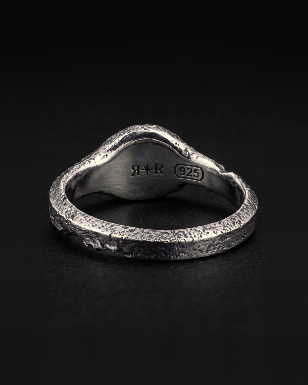 Raw VIII Ring from behind, the RR star hallmark and 925 laser engraved inside the mirror polished band