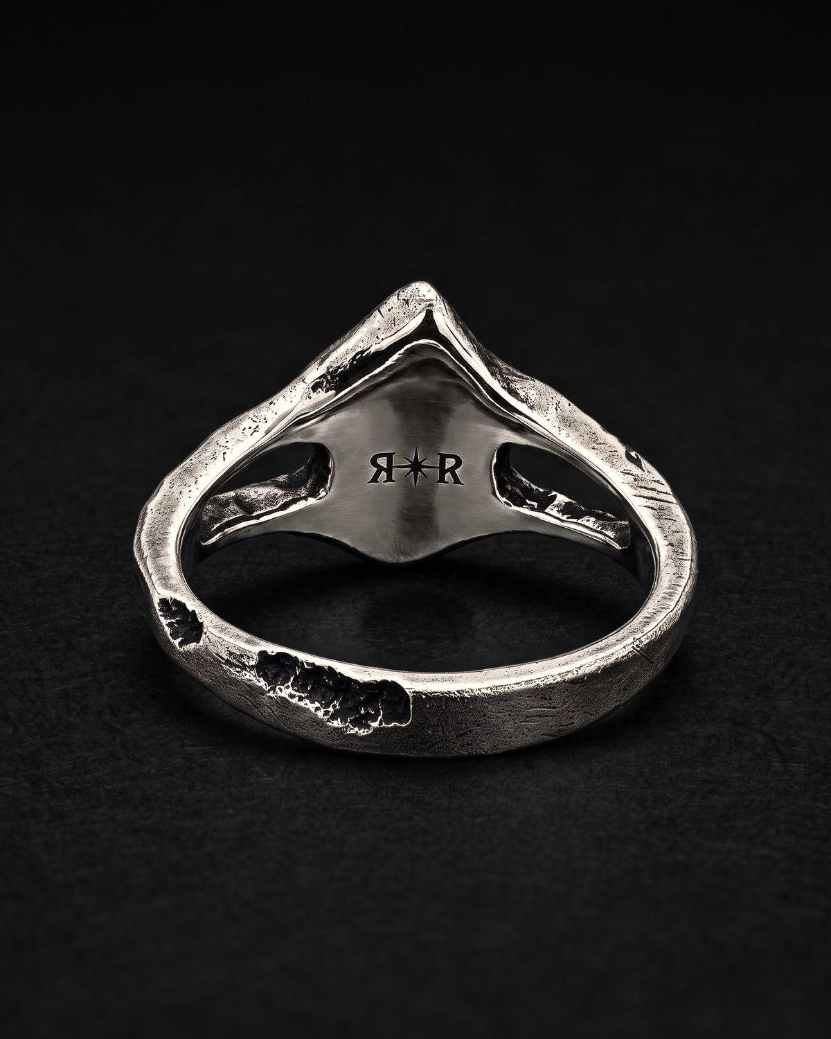 Raw XIX Ring from behind, the RR star hallmark laser engraved inside the head between the two open windows