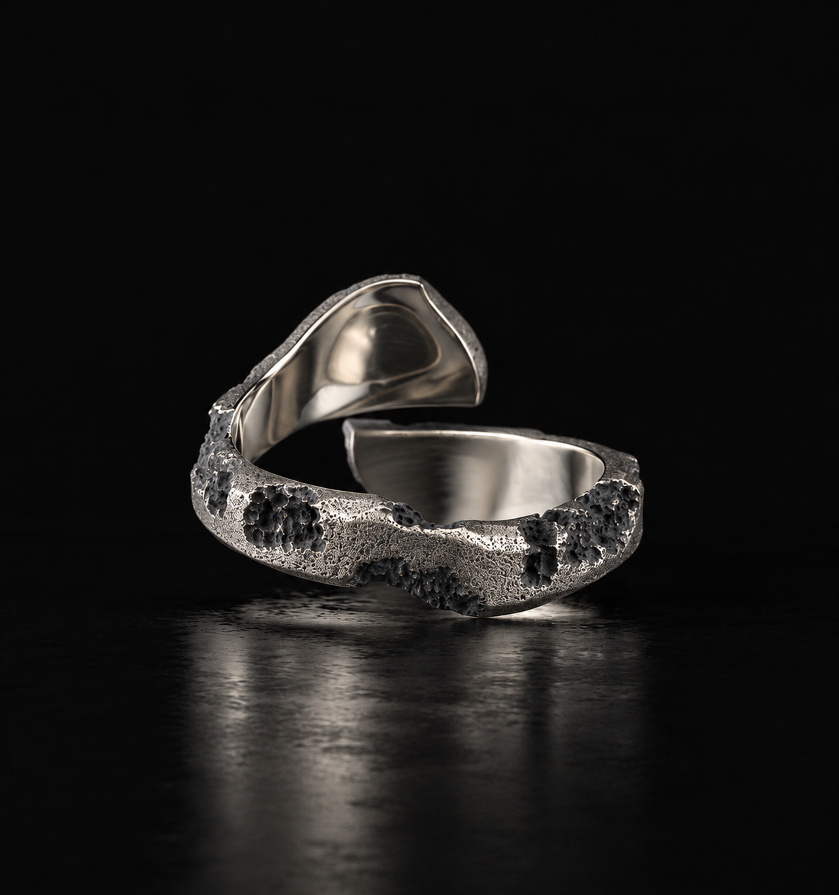 Raw XVII Ring, mirror polished inside the band against the pitted outer face
