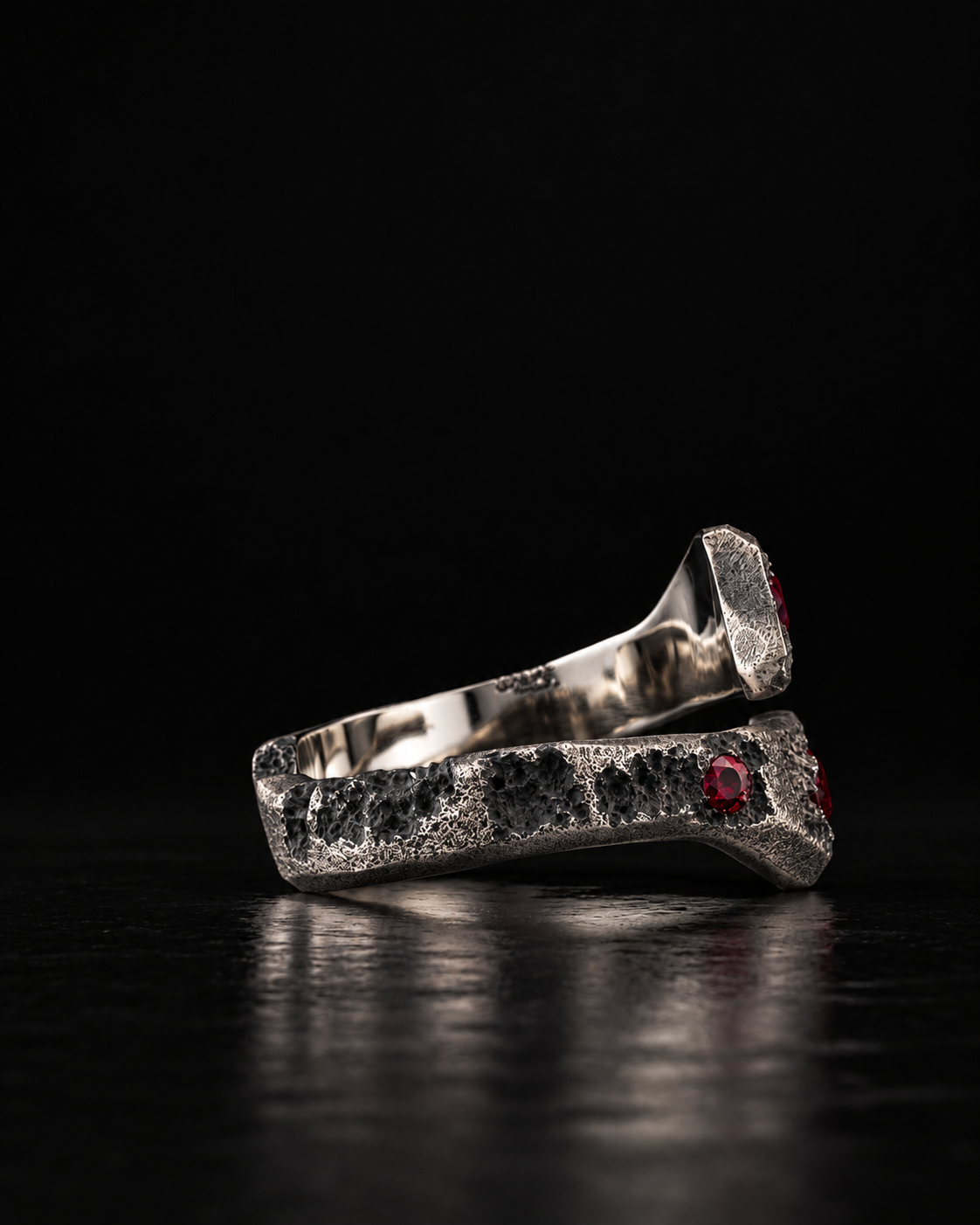 Raw XVII Ring, the open band from the back with Ruby stones showing at the edge